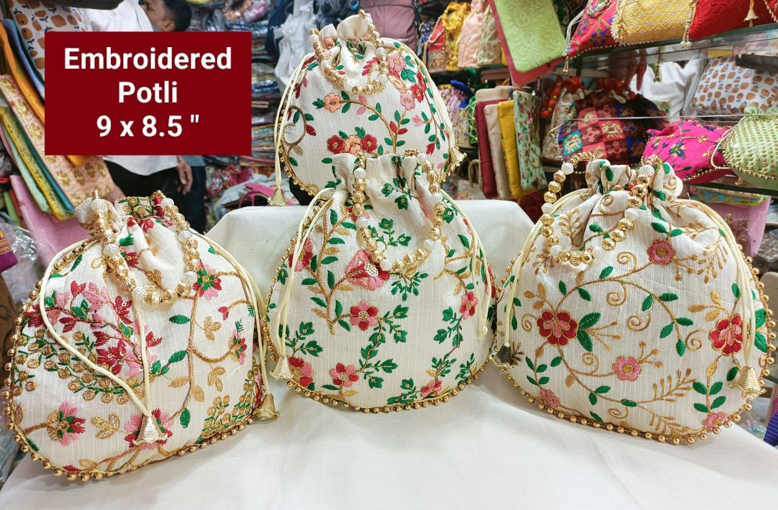 white potli bag with floral embroidery for festivals and wedding look pooja and party functions | Wedding Baby Shower Return Gift Potli Bags Pouches