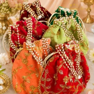 Velvet potli bags with sequin embroidery for wedding favours